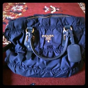 A blue Prada handbag